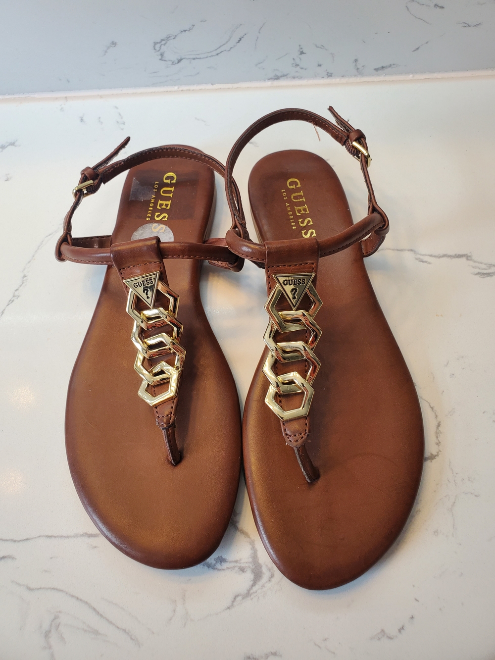 GUESS Brown Leather T-Strap Sandals with Gold Chain Accent US7